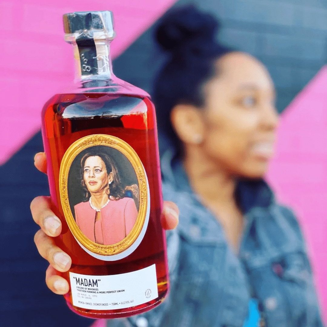 close up image of a bottle of Madam Whiskey by Republic Restoratives featuring an artist depiction of Kamala Harris on the label